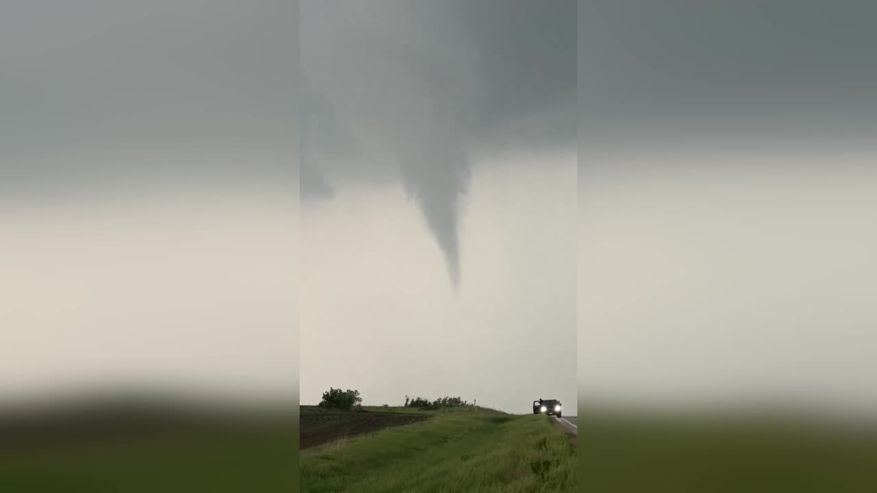 Kansas tornado tears across farmland as storm chasers race to follow ...