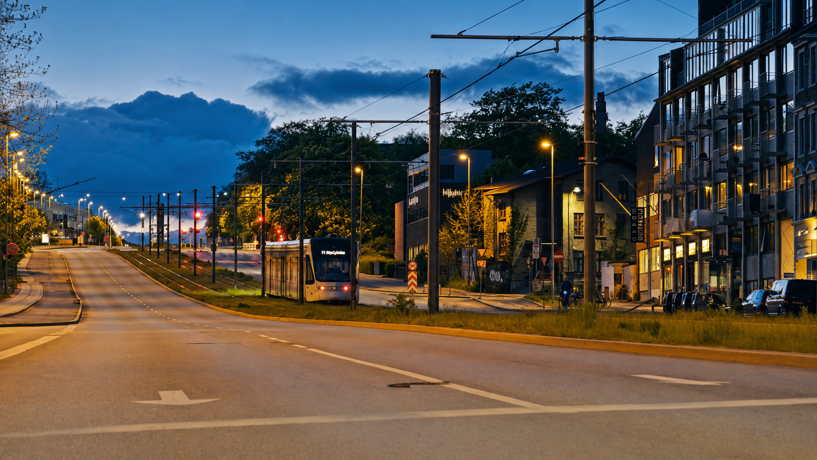 A lone tram gliding through the city as night falls