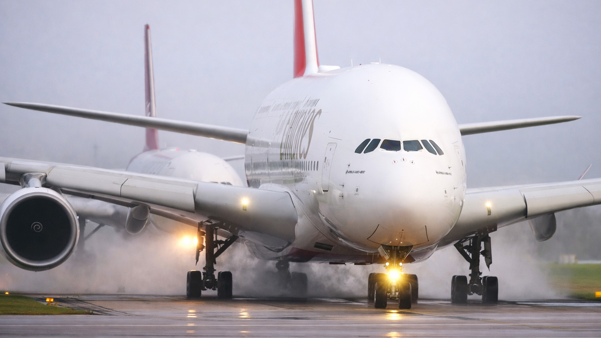 A380 roars through wet runway chaos