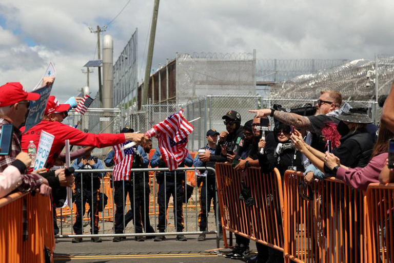 Barriers separate anti-U.S. Immigration and Customs Enforcement (ICE) protesters from pro-ICE demonstrators, as State Police stand watch, outside the Delaney Hall detention centre, in Newark, New Jersey, U.S., May 30, 2026. REUTERS/Caitlin Ochs