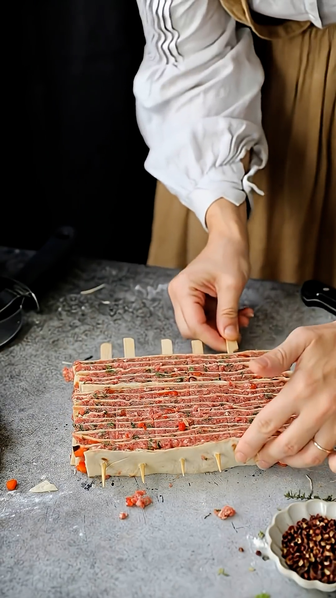 Layered flatbread filled with seasoned meat and veggies