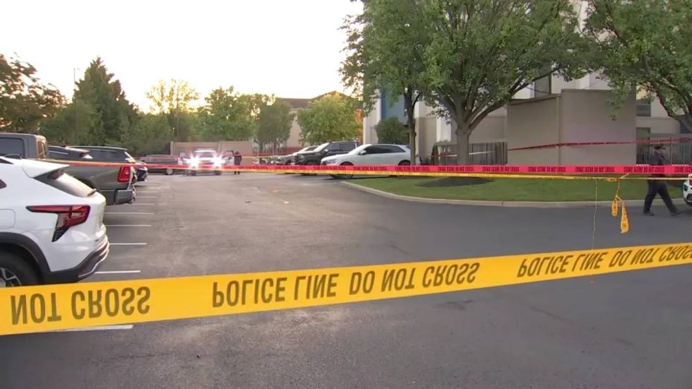 1 dead, suspect in custody after shooting at hotel in southwest ...