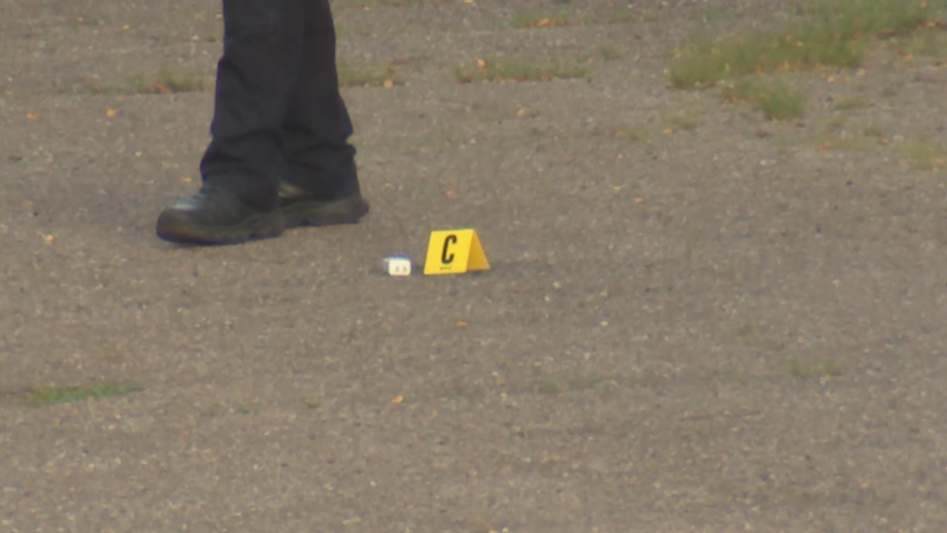 Man found dead in parking lot may have been run over, police say