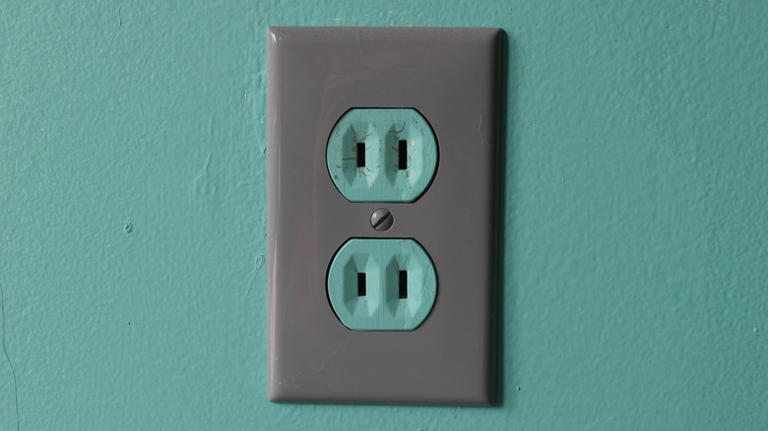 Why is one prong slot on electrical outlets bigger than the other?