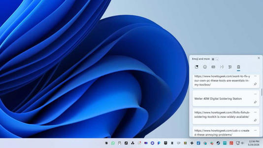 Windows 11's clipboard history window open. 