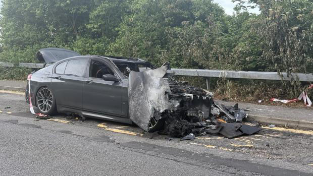 Car fire rips through BMW before rescue services attend the scene