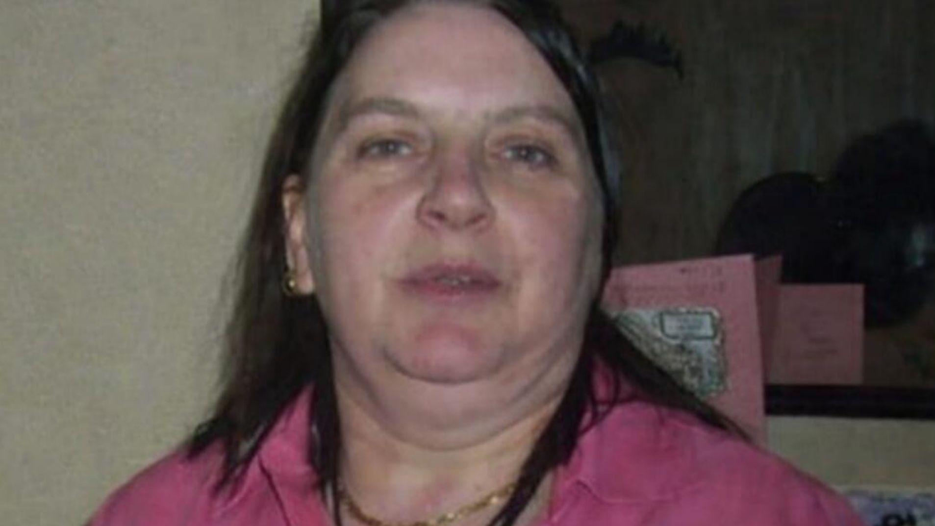 Woman dies after being hit by a reversing truck