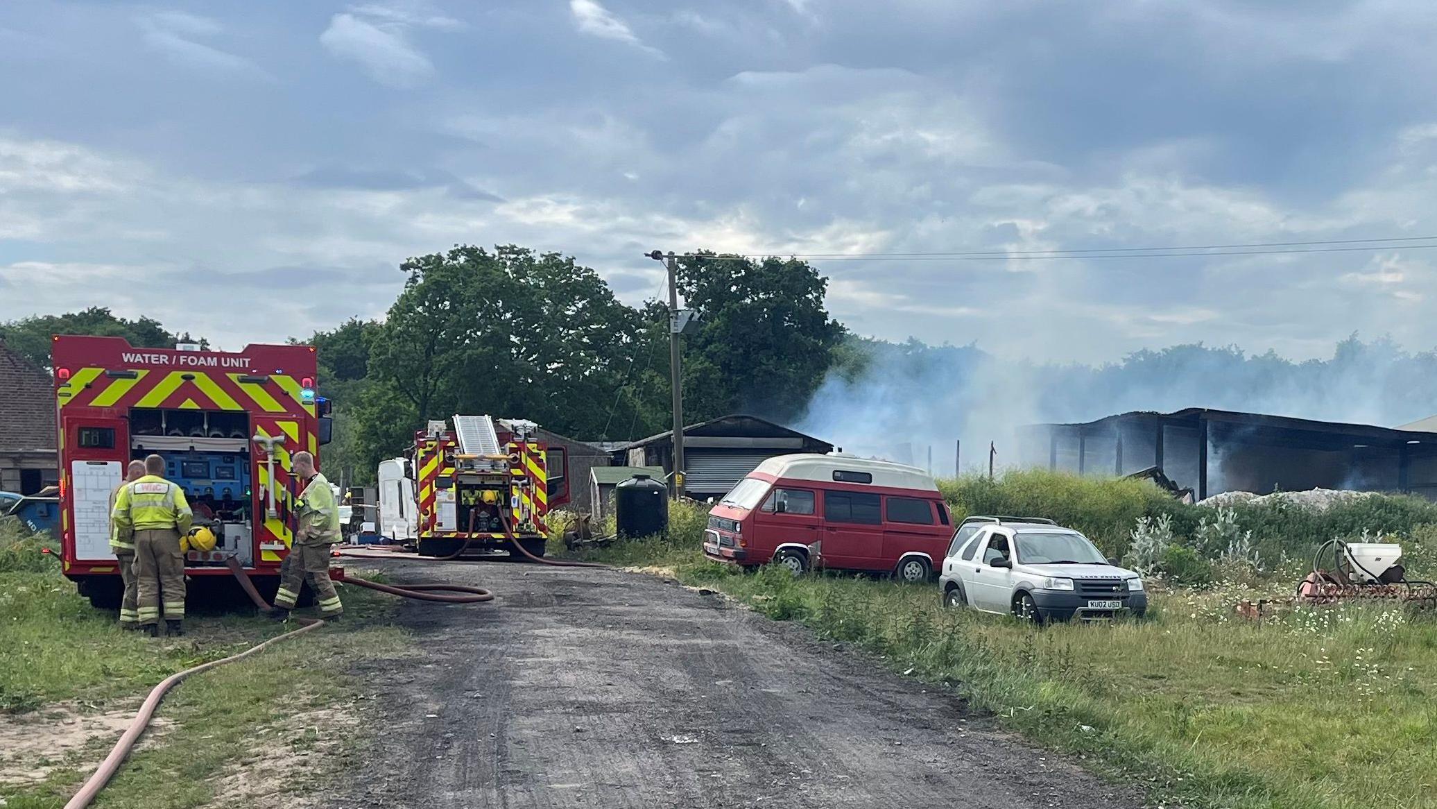Crews tackle outbuilding fire in village