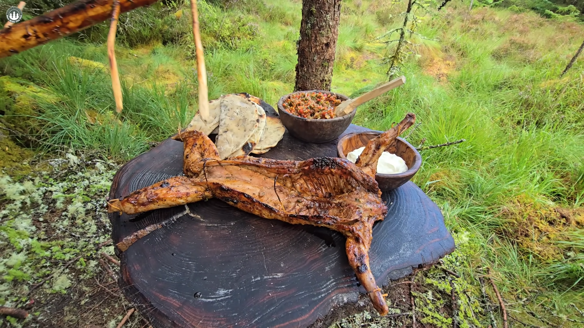 Watch how this rabbit turns perfectly crispy over the campfire
