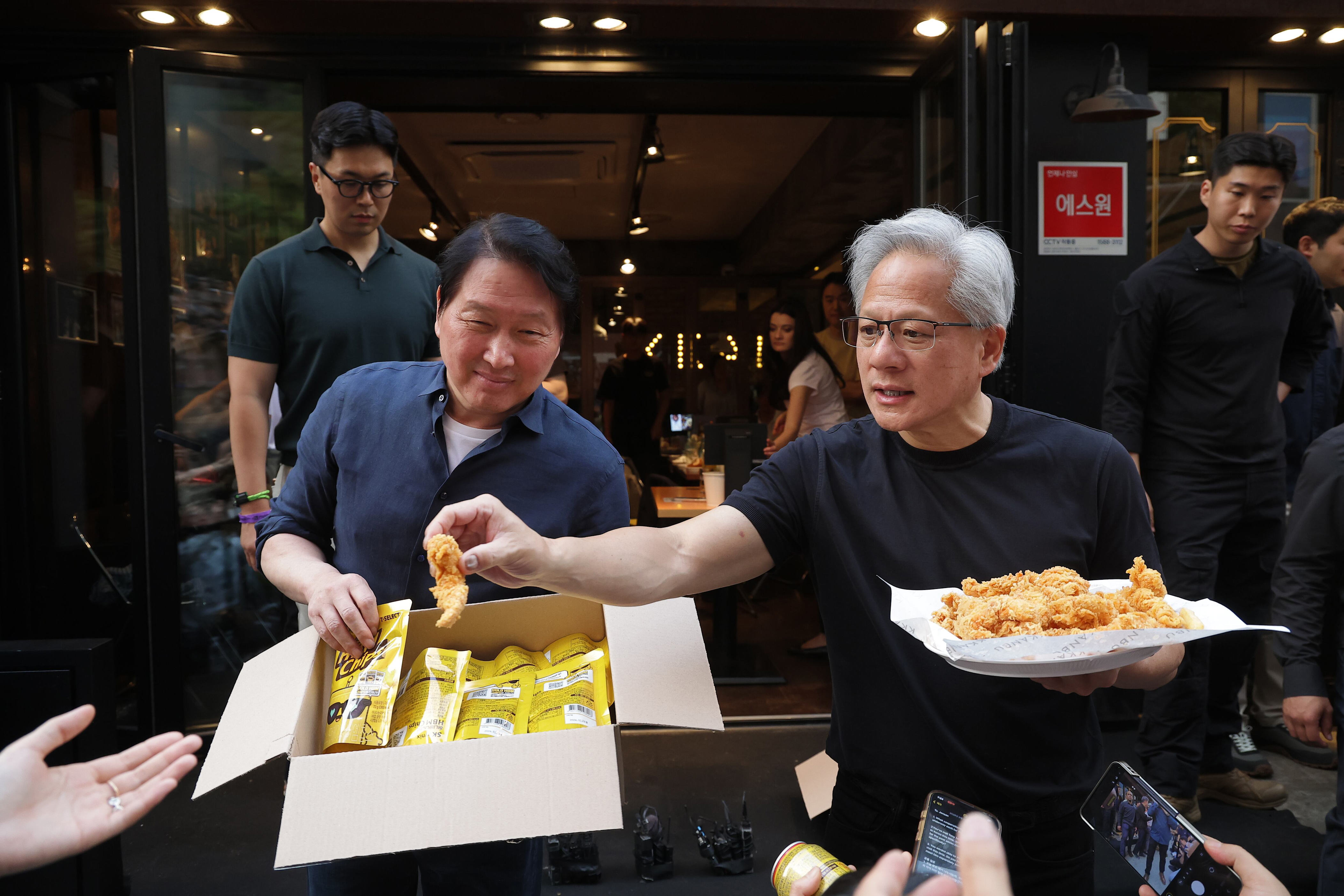 NVIDIA CEO Huang, SK's Chey collaborate on AI over fried chicken