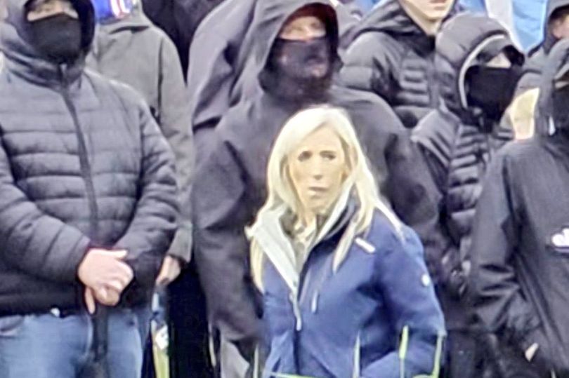 DUP MP defends photo with masked men at Scarva protest