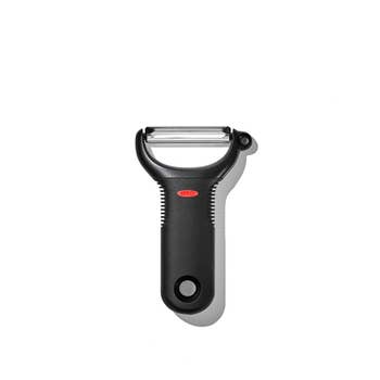 Vegetable peeler with a stainless steel blade and ergonomic black handle, suitable for various peeling tasks in the kitchen