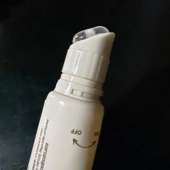Close-up of a deodorant stick showing the applicator tip and part of the label