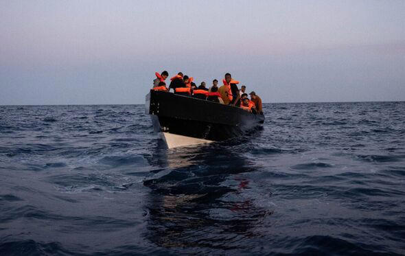 A wooden boat carrying 58 migrants, including 18 unaccompanied minors from Sudan, Eritrea, Egypt, Bangladesh and Somalia, is rescued by the NGO vessel