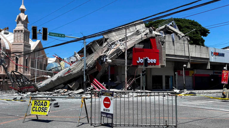 A road is blocked near the collapsed building. Pic: Reuters