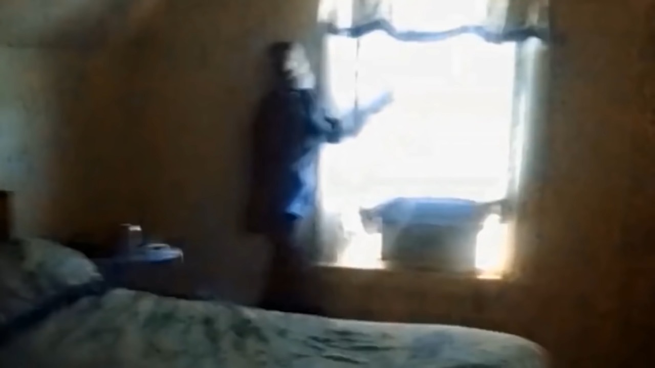 He filmed his bedroom window at night - then a human-like shadow vanished
