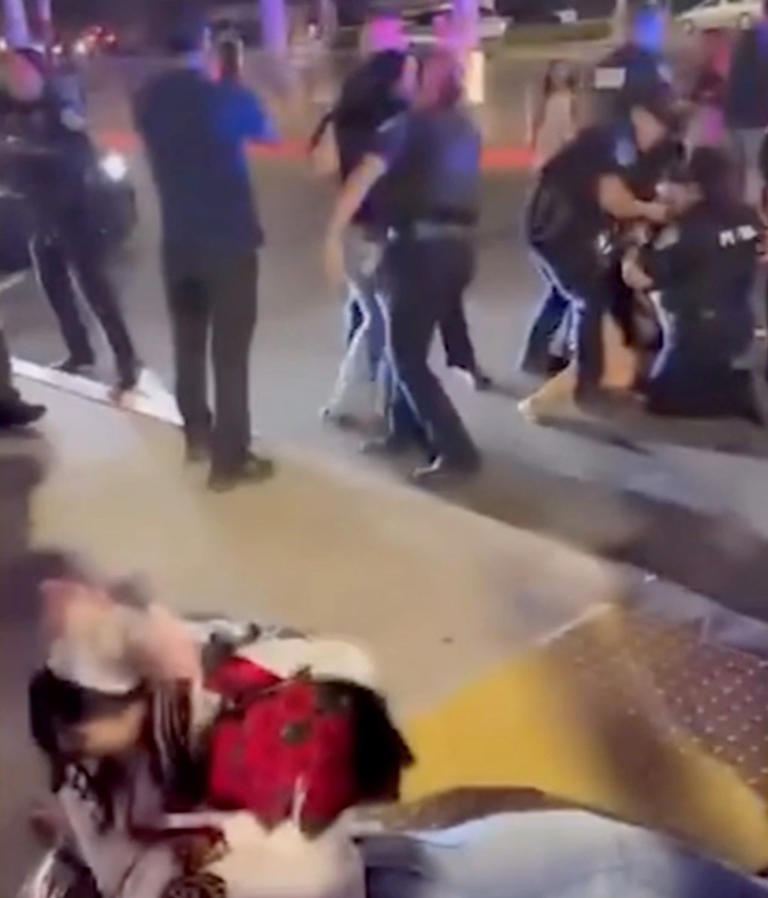 Wild scuffle involving cops, graduates, parents breaks out after ...