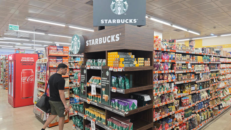 On the 2nd, a citizen passes by a Starbucks display shelf in the underground grocery store of the Trump Tower in Istanbul. /Courtesy of Seo Bo-beom