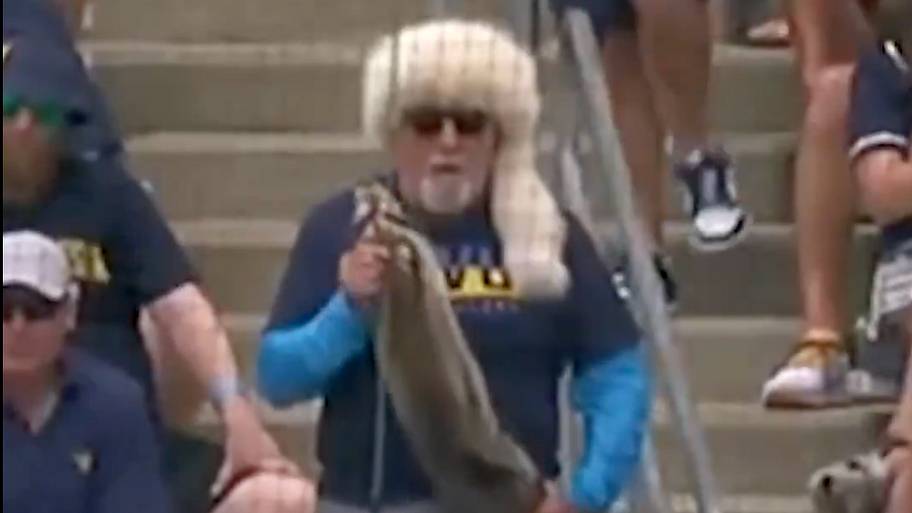 Lightning McQueen and a guy with a raccoon showed up to WVU's super ...
