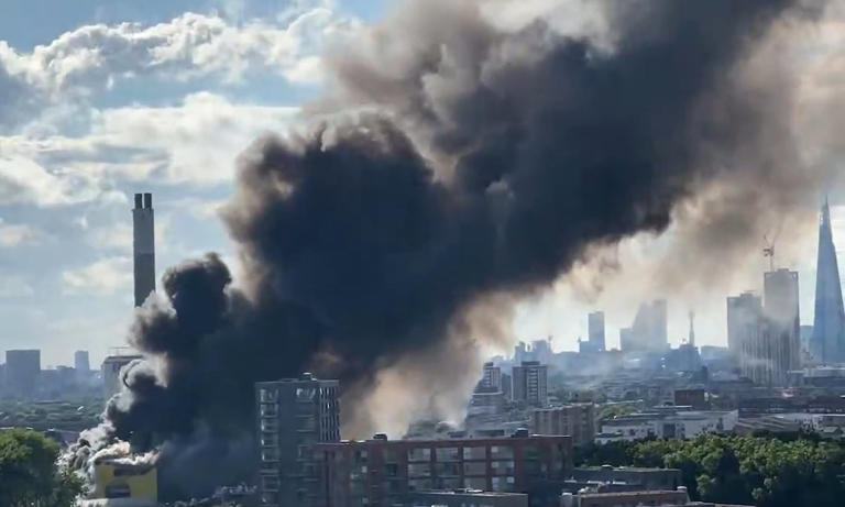 Around 100 firefighters battle huge blaze at recycling centre as smoke ...