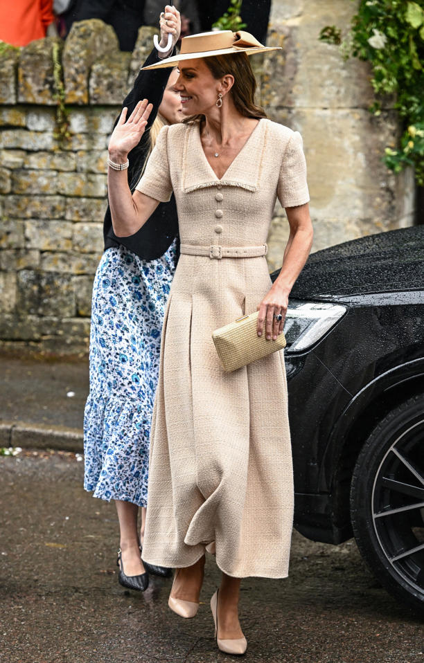 Kate, Princess of Wales, leaves following the wedding of Princess Anne’s son, Peter Phillips, and Harriet Sperling, wearing a tan colored dress and an heirloom pearl bracelet. / Dylan Martinez / REUTERS