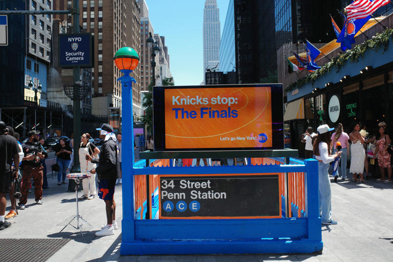 Orange and blue subway station entrance on sale for Knicks fans