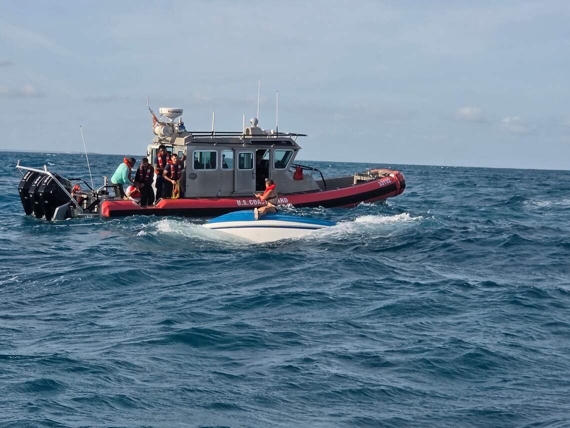 Coast Guard rescues three from capsized boat off Florida Keys