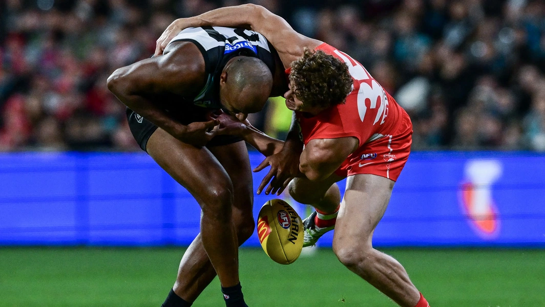 Swans edge Power to join Dockers atop AFL ladder