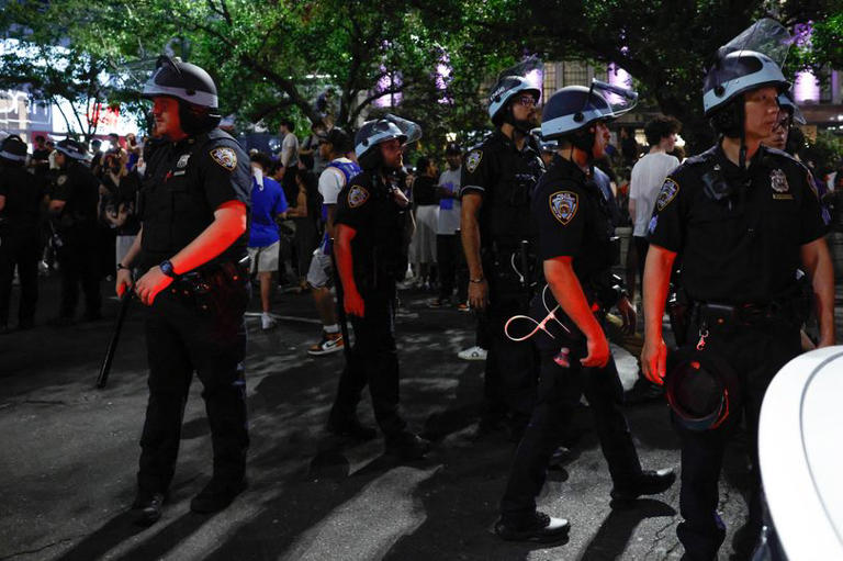 New York Knicks fans riot as bus in flames, gunshots fired and police ...