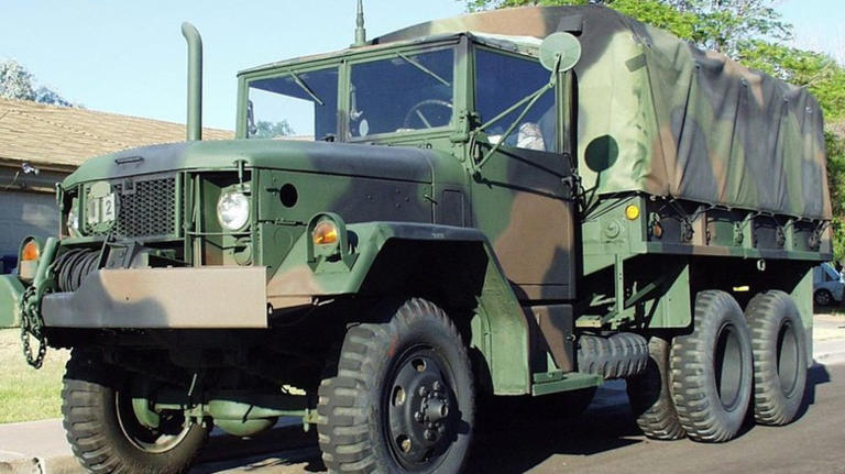 What is a 'deuce and a half' military truck, and how did it get its name?