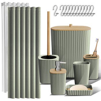 Bathroom accessory set with ribbed texture, including a shower curtain, hooks, toothbrush holder, soap dispenser, waste bin, and more
