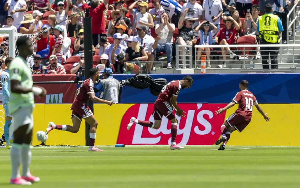Khoukhi’s stoppage-time header earns Qatar historic draw