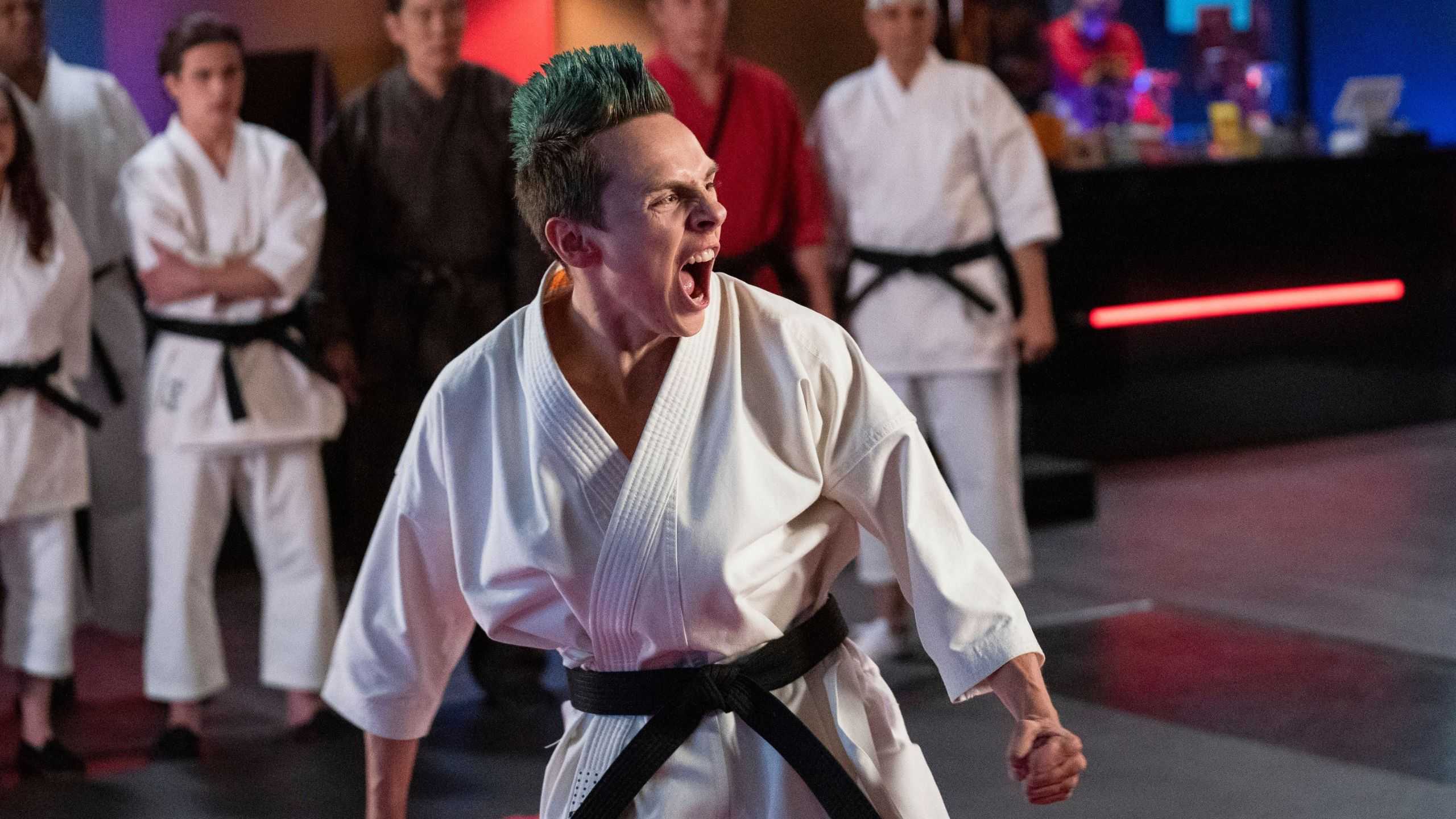 Hawk wearing a gi and shouting in Cobra Kai