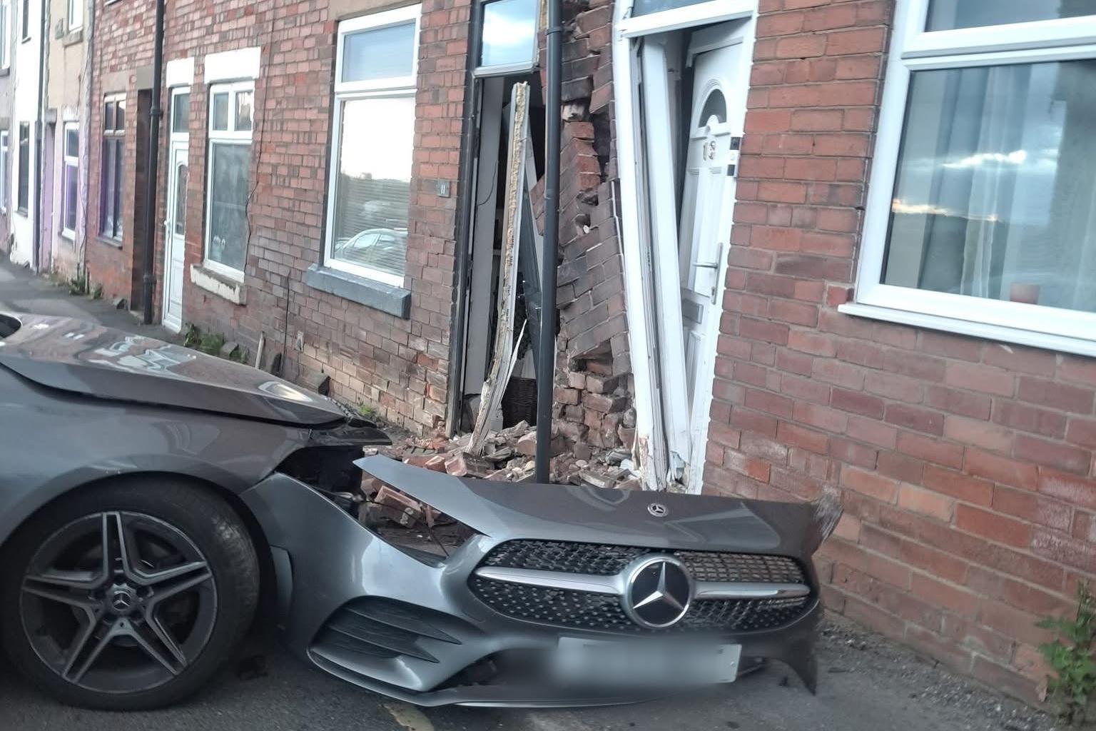Crash that saw car collide into two properties near Chesterfield leaves ...