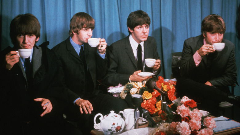 The Beatles drinking tea