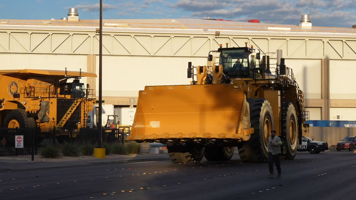 This giant wheel loader looks bigger than the road