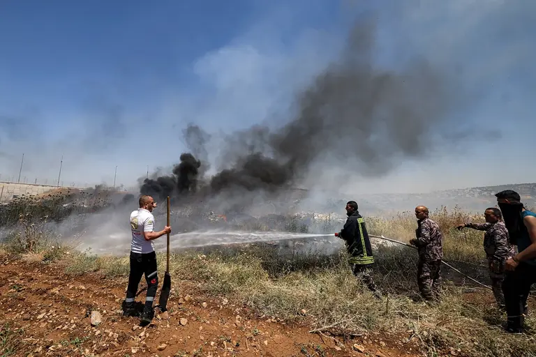 Israeli settlers set fire to West Bank vehicles, mosque