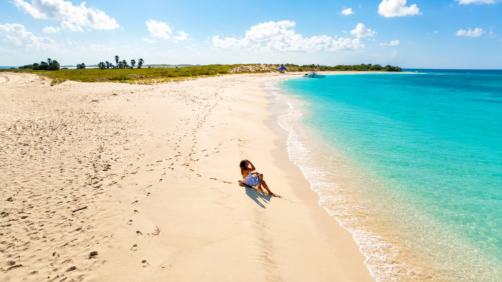 a-hidden-tropical-beach-with-endless-white-sand-and-unreal-blue-water