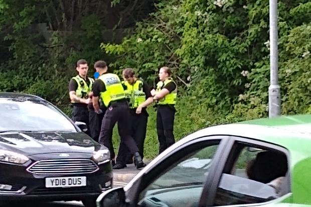 'Dramatic' incident as police swoop on busy Bradford road to detain man