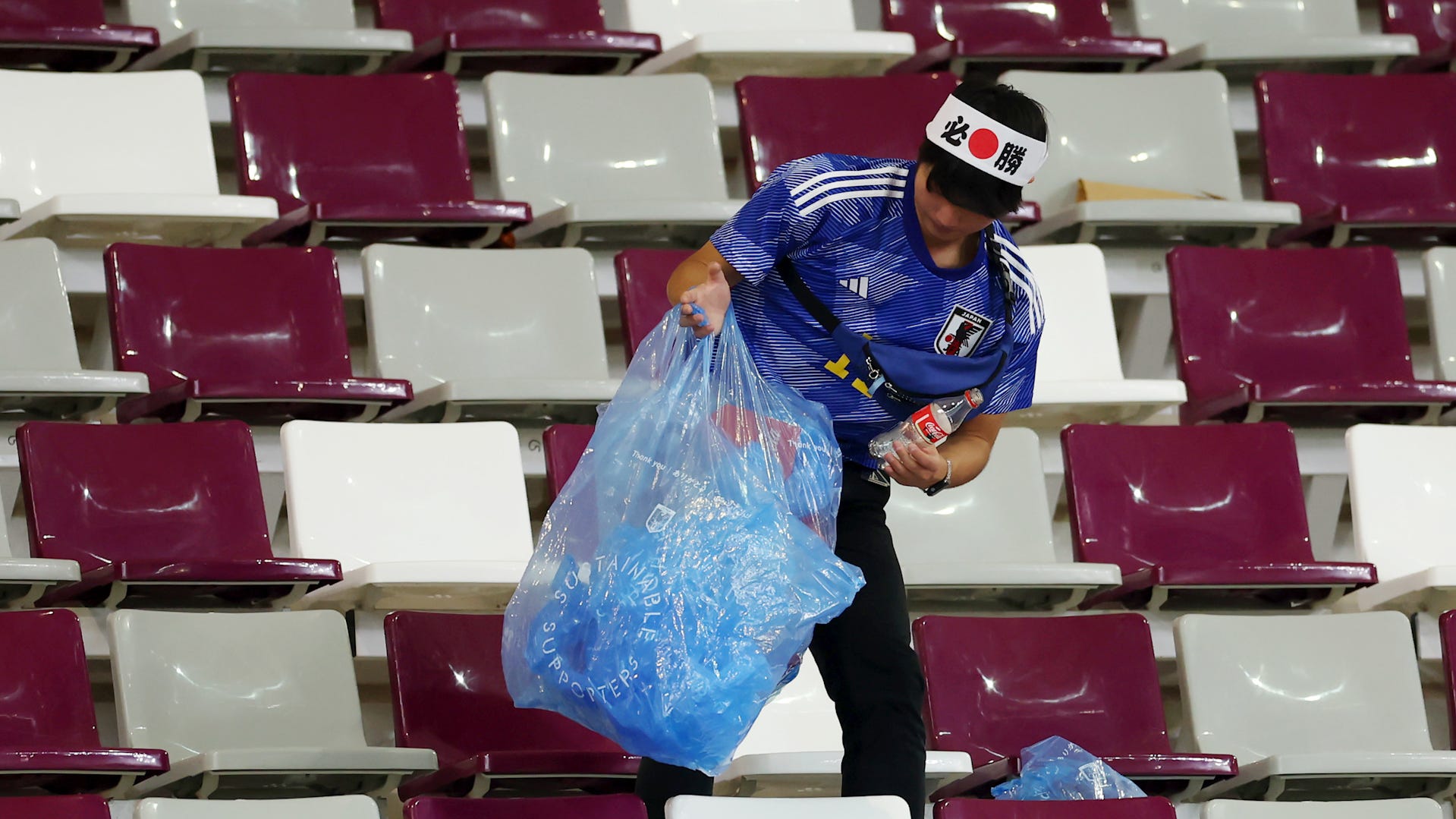 Japan fans clean World Cup stadium after draw with Netherlands