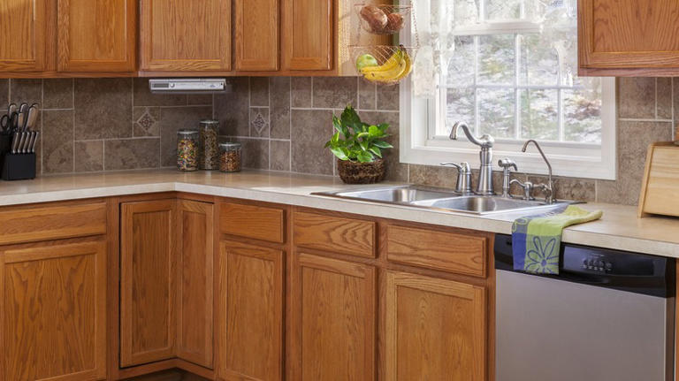 Forget expensive upgrades: Give dated honey oak cabinets a modern look