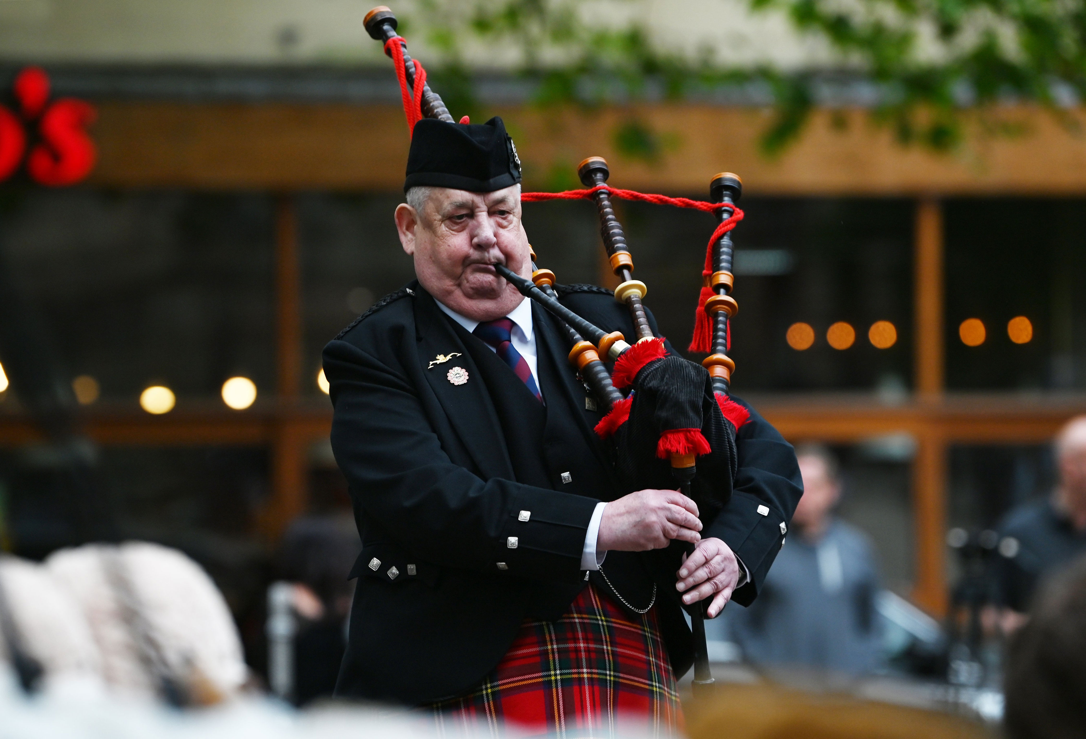 A piper will play at the vigil