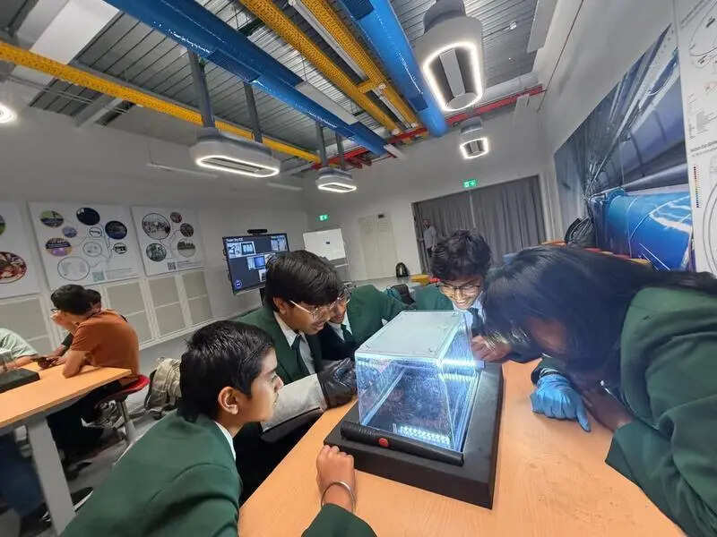 Five DPS MIHAN students take microrobots project to CERN, walk where the God particle was found