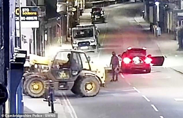 Moment balaclava-clad thieves use a stolen telehandler to rip a cash ...