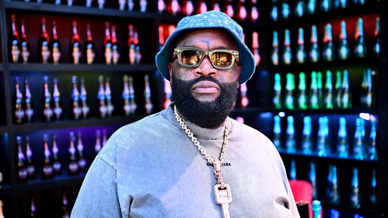 Rick Ross jokingly sneaks around Costco and AutoZone after catching ...