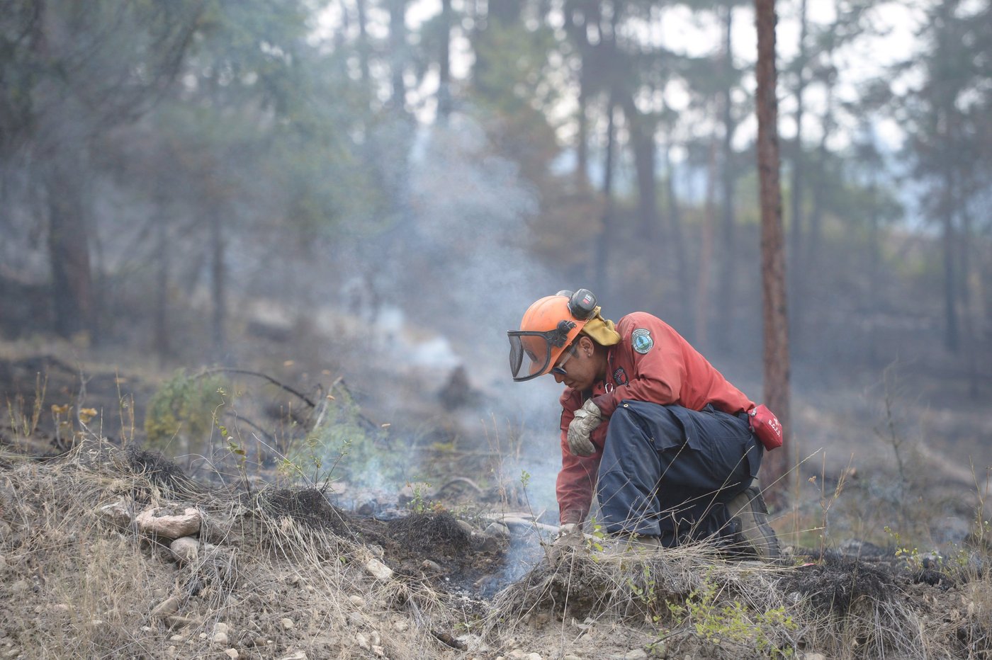 Evacuation order downgraded to alert as wildfire is held in West ...