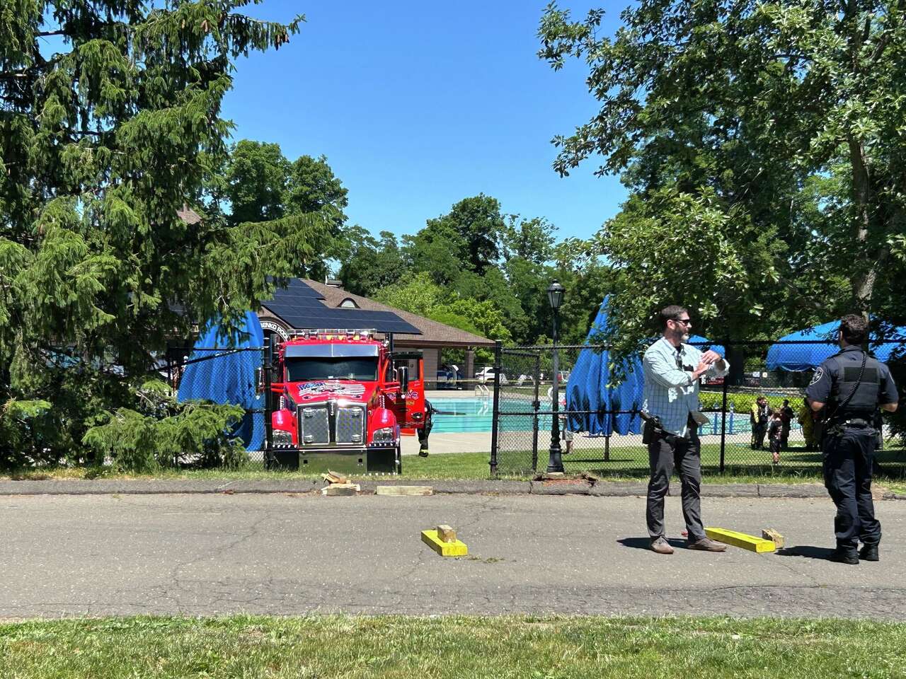 Car crashes through fence and plunges into New Canaan public pool ...