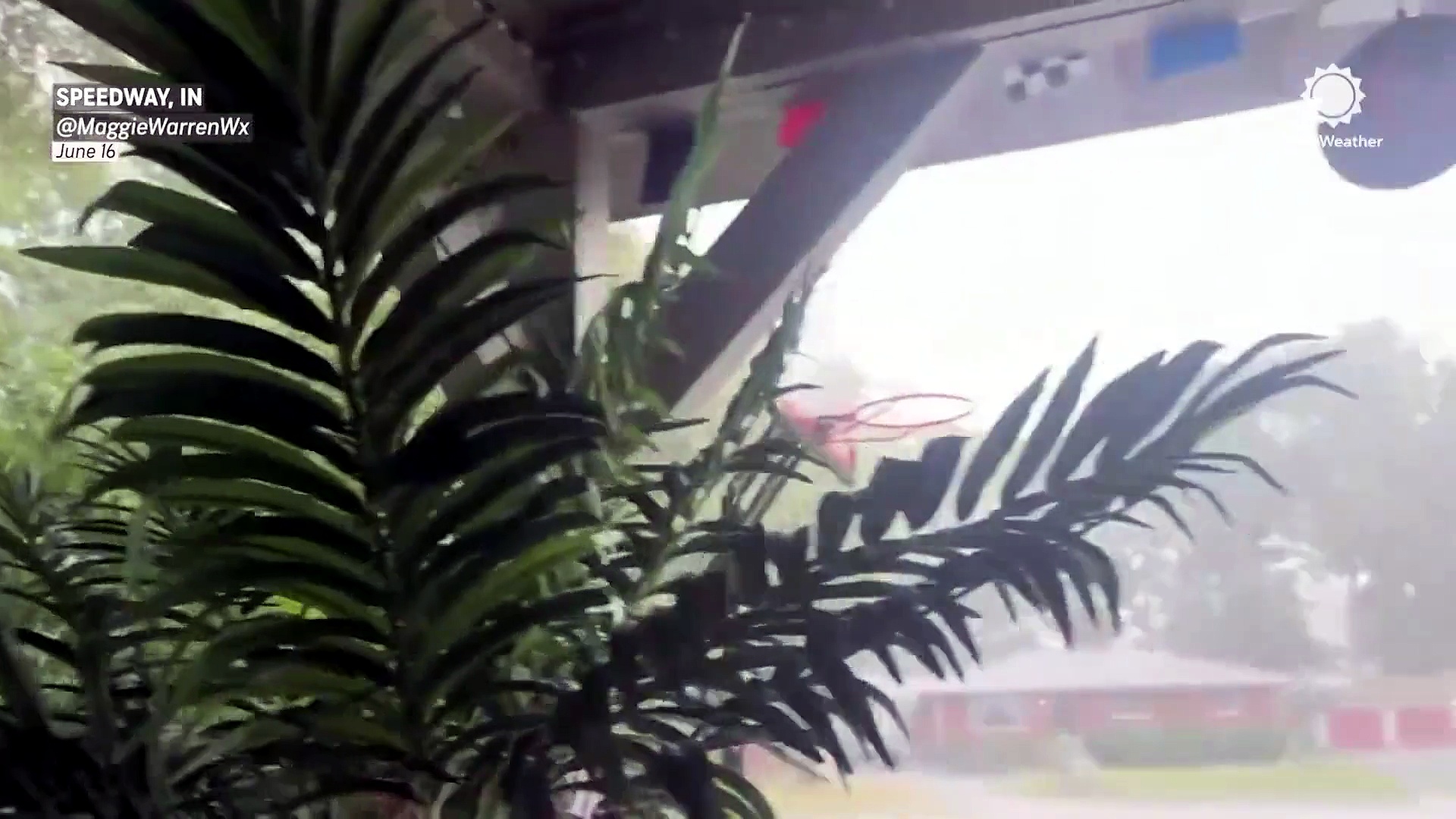 Hail pours down and tornadoes swirl as severe storms tear through Indiana