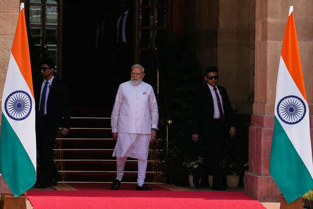 No hug, just handshake: Modi’s silent message to Trump