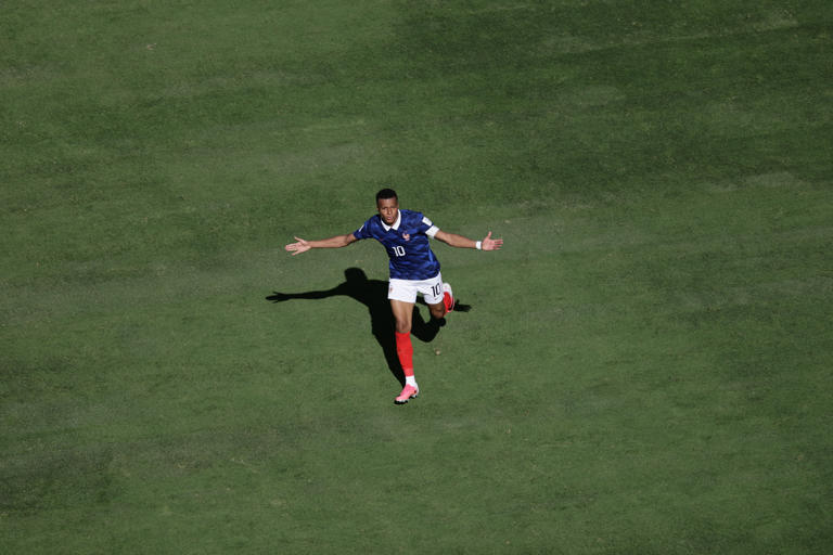 France's Kylian Mbappe celebrates after scoring third goal during the World Cup Group I soccer match between France and Senegal in East Rutherford, N.J., near New York, Tuesday, June 16, 2026. (AP Photo/Adam Hunger)